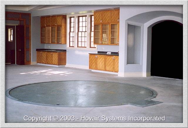 a vehicle turntable by Hovair Systems installed in a garage