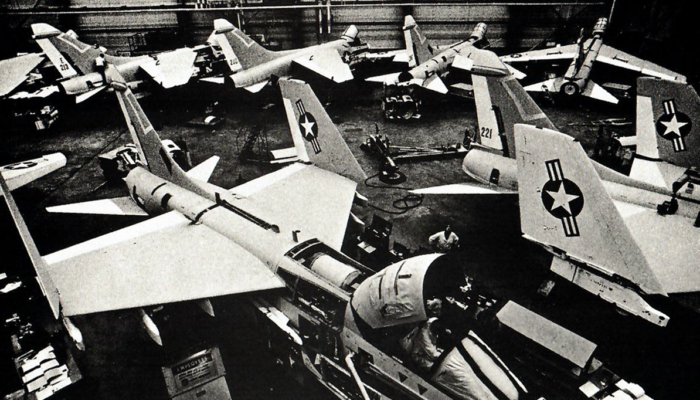 rows of fighter jets tightly positioned by air bearings in a military facility