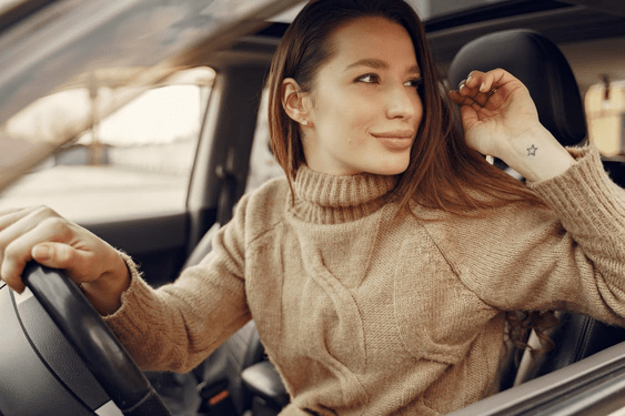 Woman reversing a car
