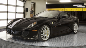 a black vehicle on a car turntable by Hovair Systems