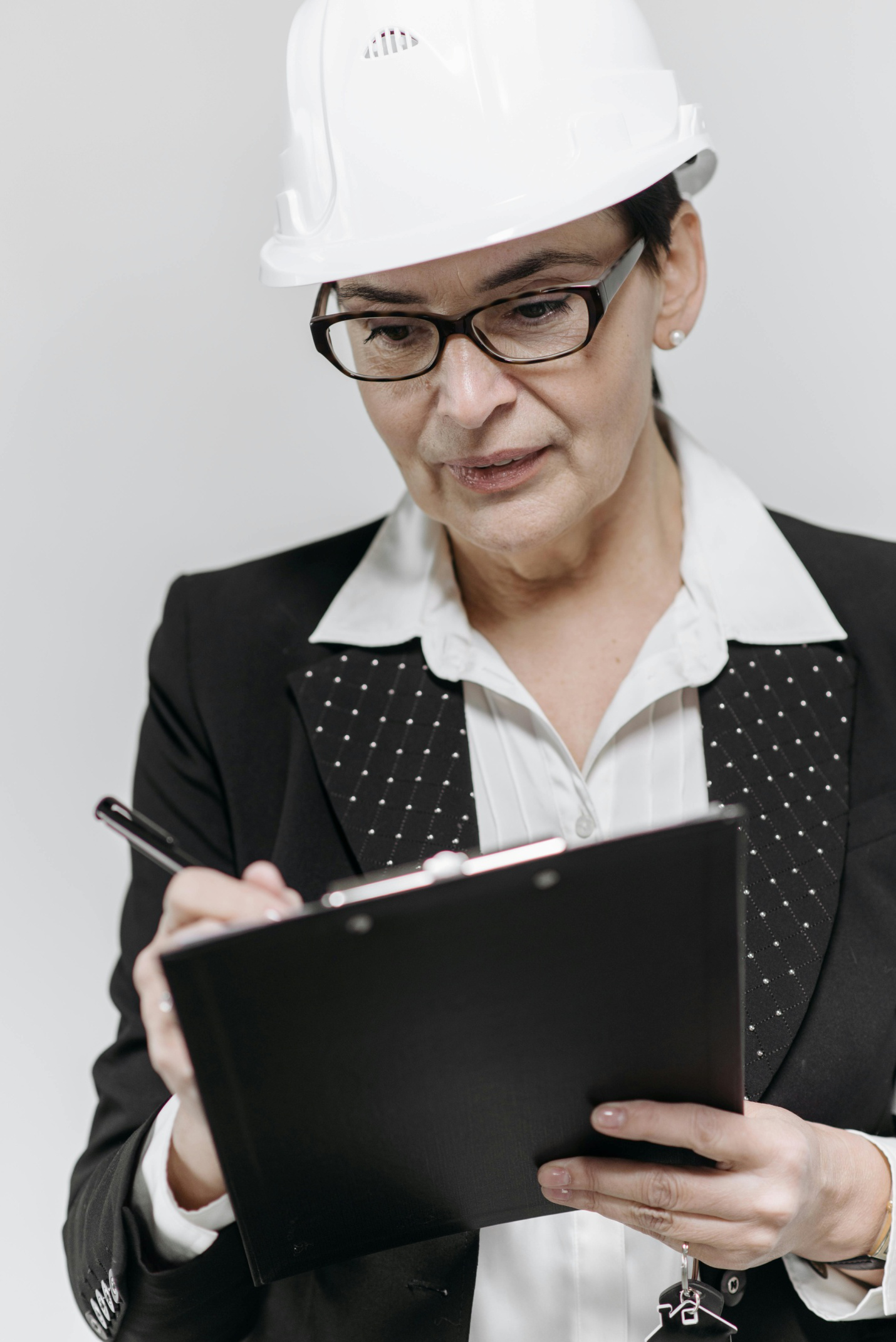 A woman writing on a piece of paper